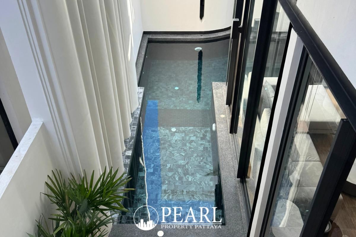 4 Bedroom House for Sale at Inara Villa elegant master bedroom with king-size bed